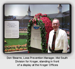 Don Stearns, LPM, Mid South Division for Kroger, standing in front of a display at the Kroger Offices